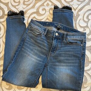 WHBM Classic Rise Skinny Ankle Jeans with black lace detail